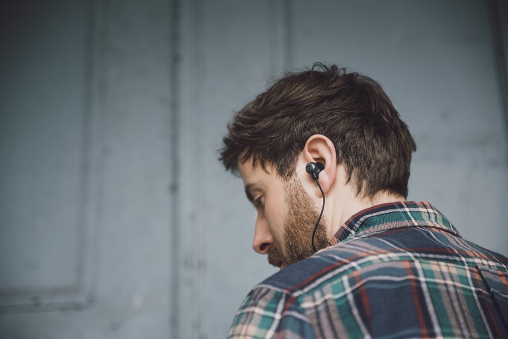 Man met wired headphones